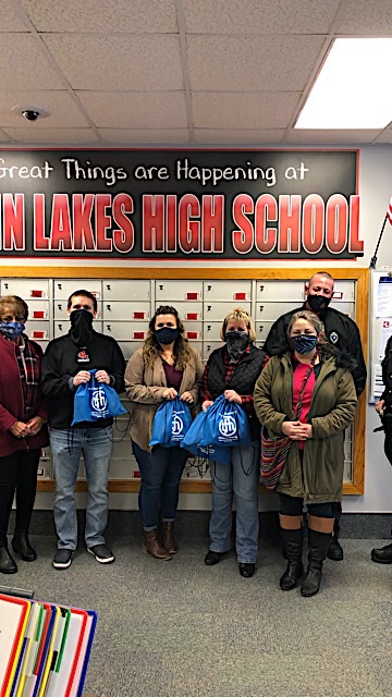 L-R: Mayor's Advisory Council for the ADA Board Member Lexi Pool, Twin Lakes High School Dean of Students Dan Seiltz, TLHS Assistant Principal Desiree Swaim, TLHS Principal Melissa Whitehead, ADA & Title VI Coordinator Katherine Tardiff, Assistant Chief of Police Tony Stroup, Probationary Officer Sam Manion